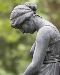 sad-woman-statue-450x300.jpg